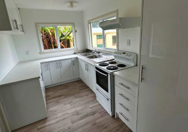 Stylish Northland kitchen renovation by Legacy Construction featuring modern cabinetry and finishes.