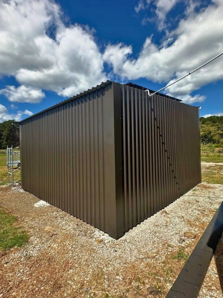 Steel roof pole shed built for Northland property owner, combining strength and practicality.