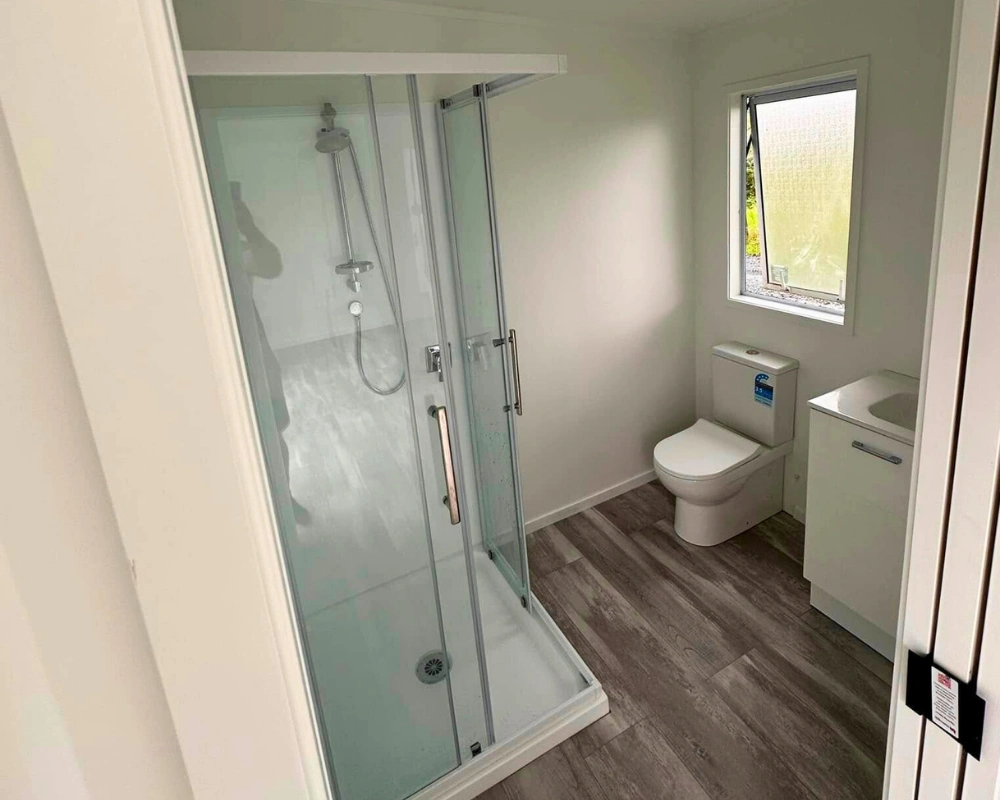 Northland bathroom remodel featuring waterproofed shower and updated fixtures