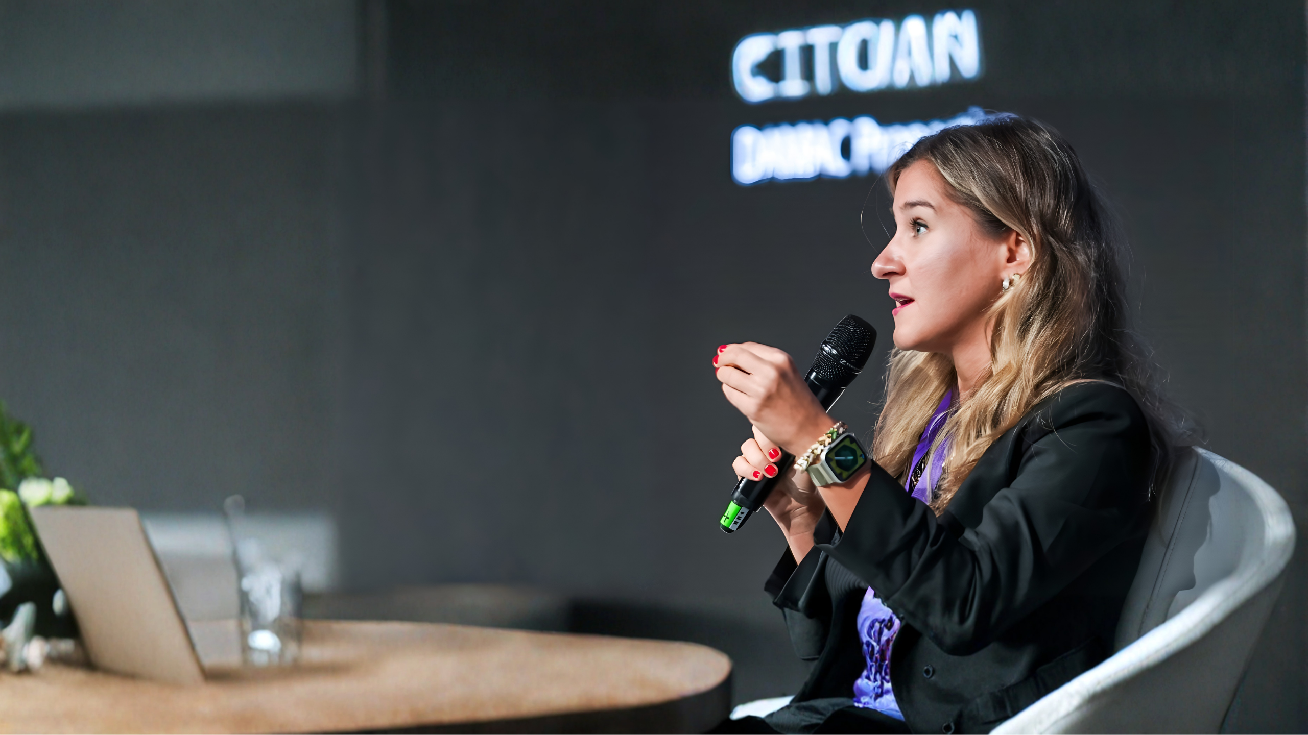 Bahar Selman delivering a keynote presentation