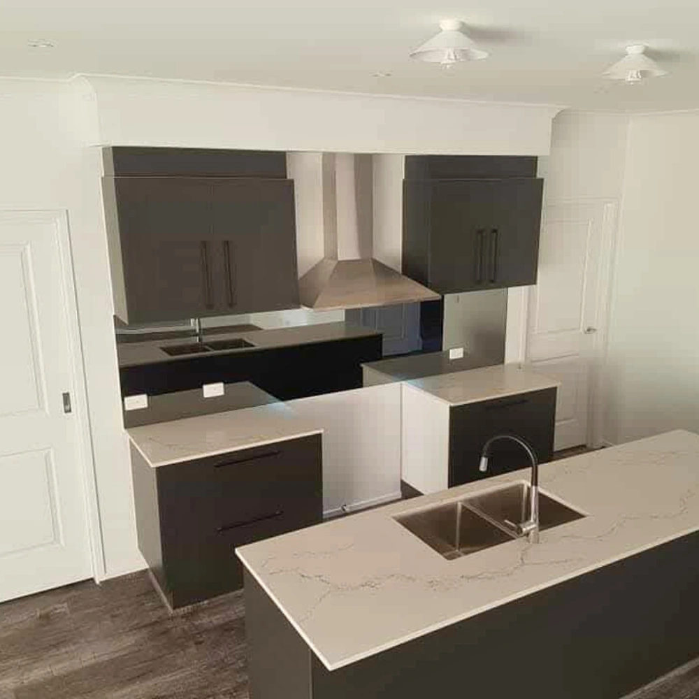 Coloured Glass Solutions Melbourne – mirror splashback installed behind kitchen benchtop