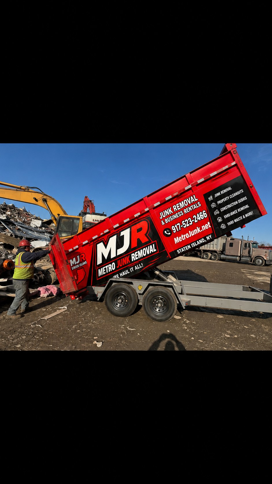 MJR dump trailer unloading at dump