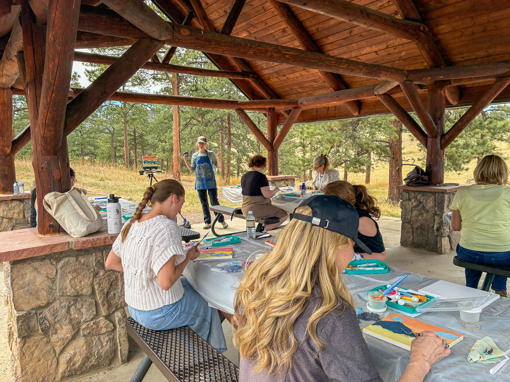 Guests painting outdoors Guests painting outdoors