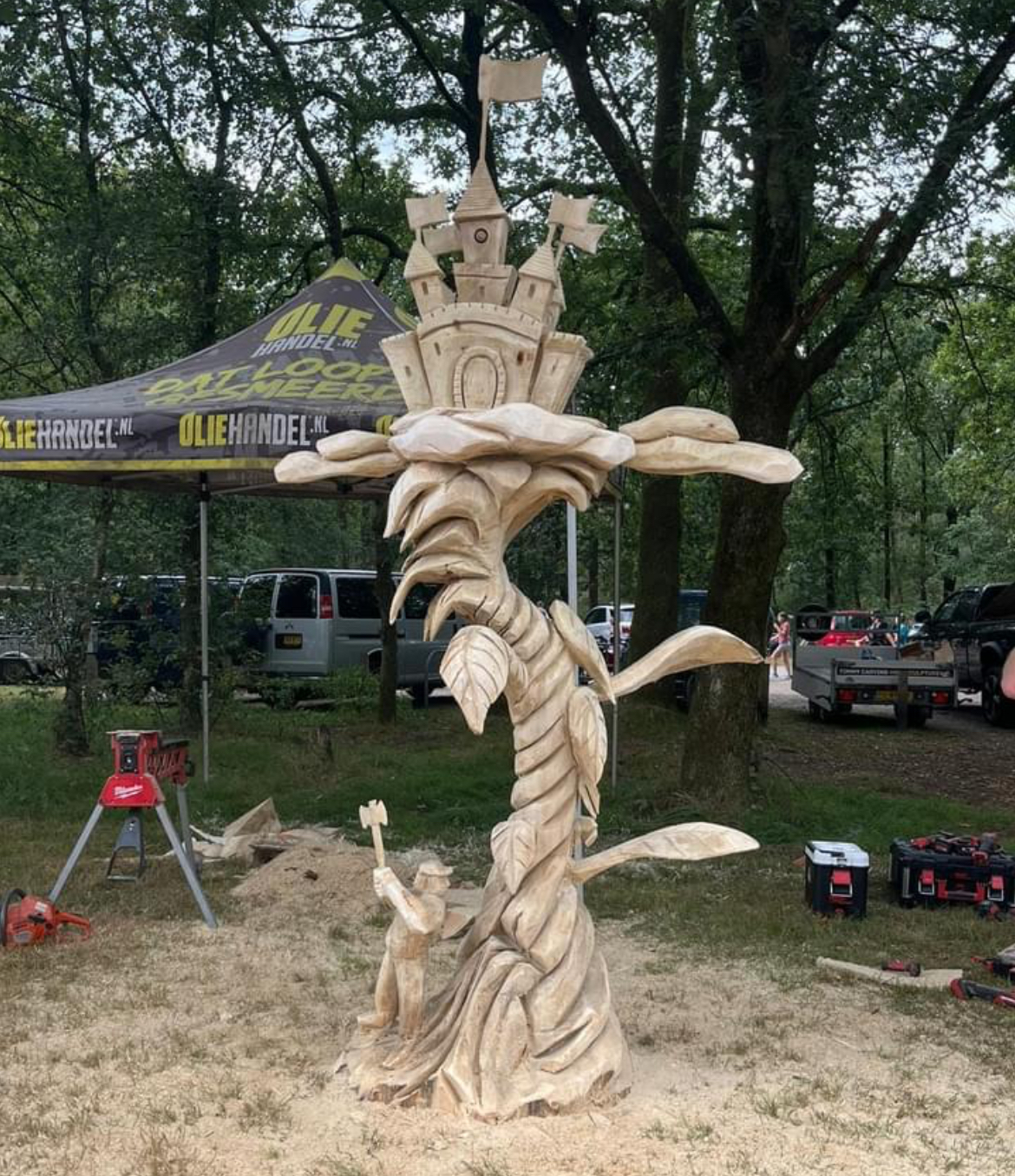 Chainsaw-carved owl and branches