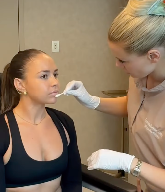 An MDW nurse treating a patient in Brickell