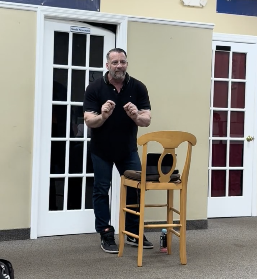 Pat Necerato speaking to a sales team