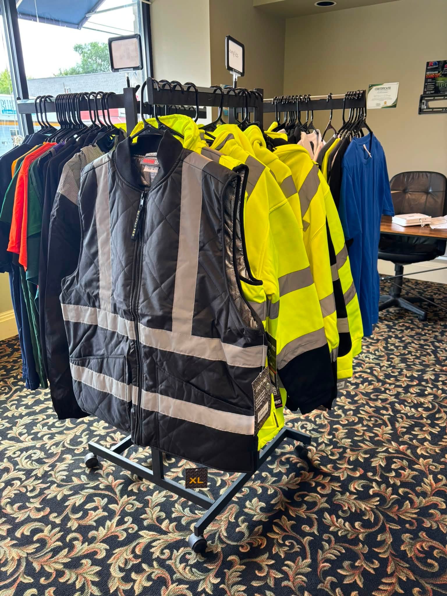 Workwear, high-visibility apparel and safety gear displayed in the RD Graphics & Design showroom