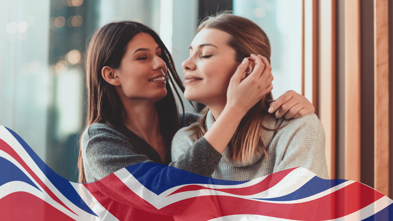 two lesbians with the UK flag