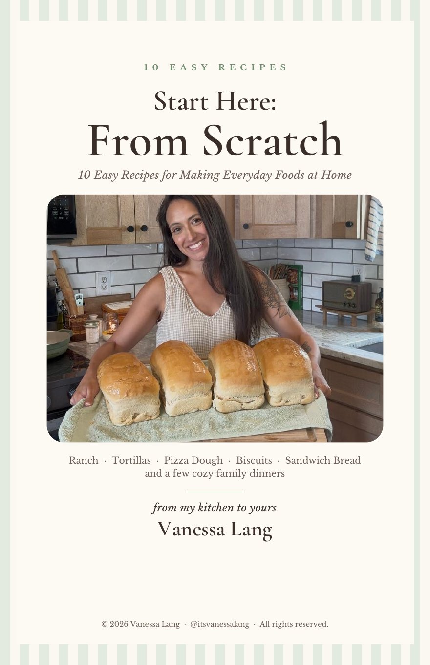 Cover of the cookbook Start Here: From Scratch by Vanessa Lang, showing Vanessa holding four loaves of homemade bread