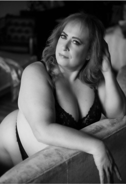 black and white photo of woman wearing lingerie