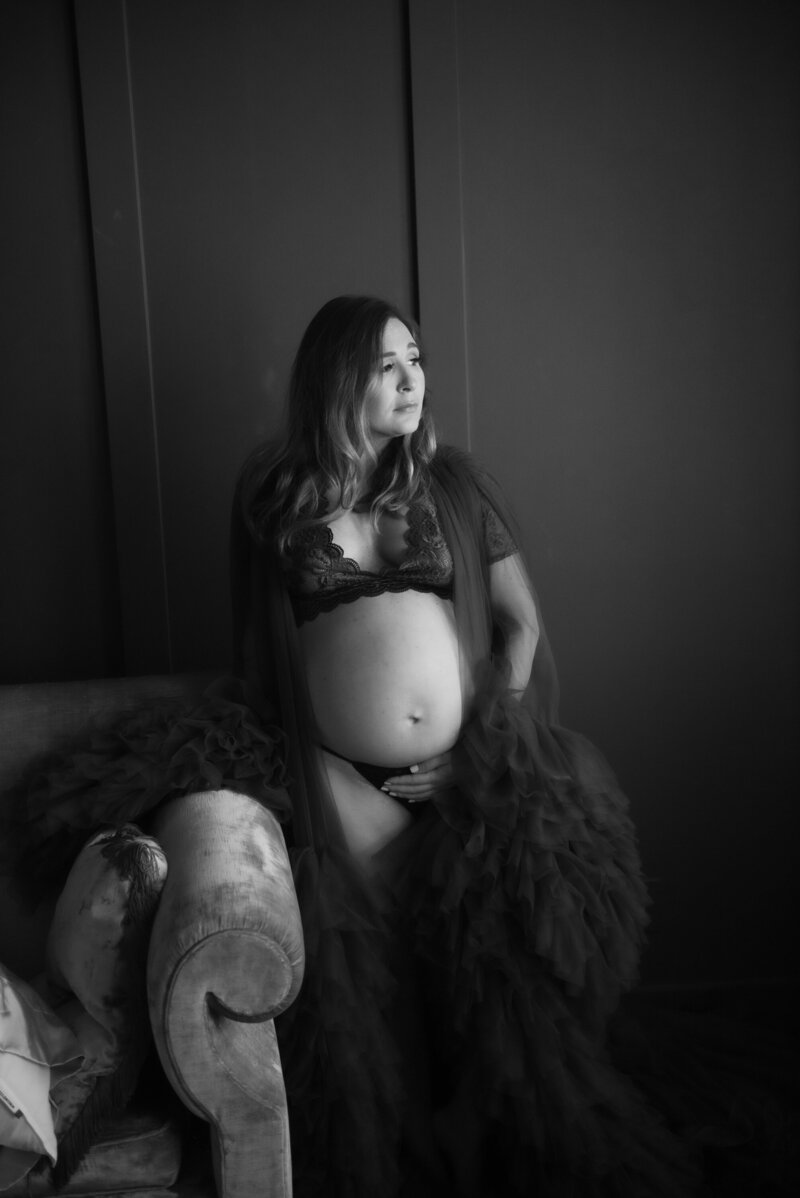 black and white photo of pregnant woman