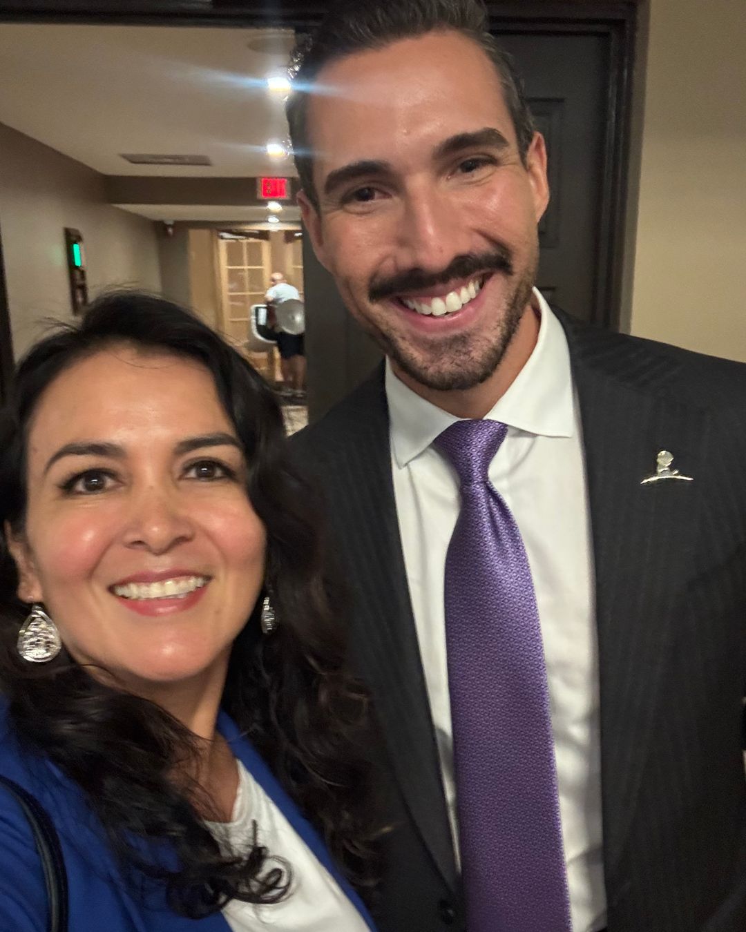 Elizabeth Piscocama with Sebastian Guerra at the 2026 Miami Retirement Summit in Coral Gables
