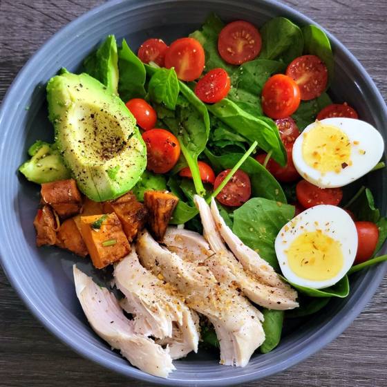 Chicken avocado bowl with sweet potato and egg