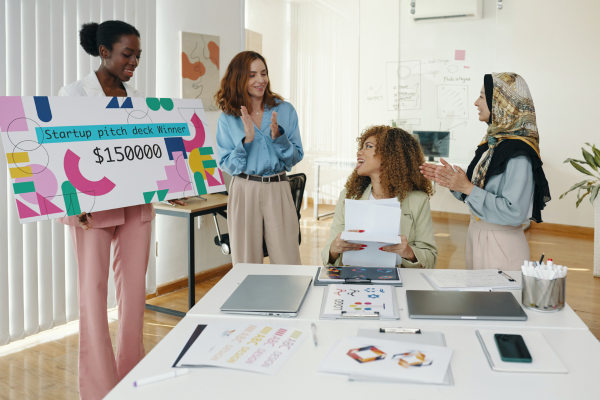 women at startup smiling business