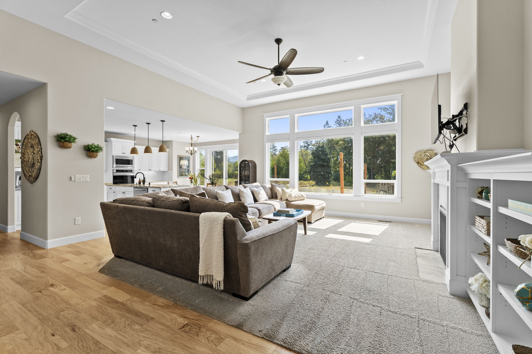 Sunlit living room with large windows