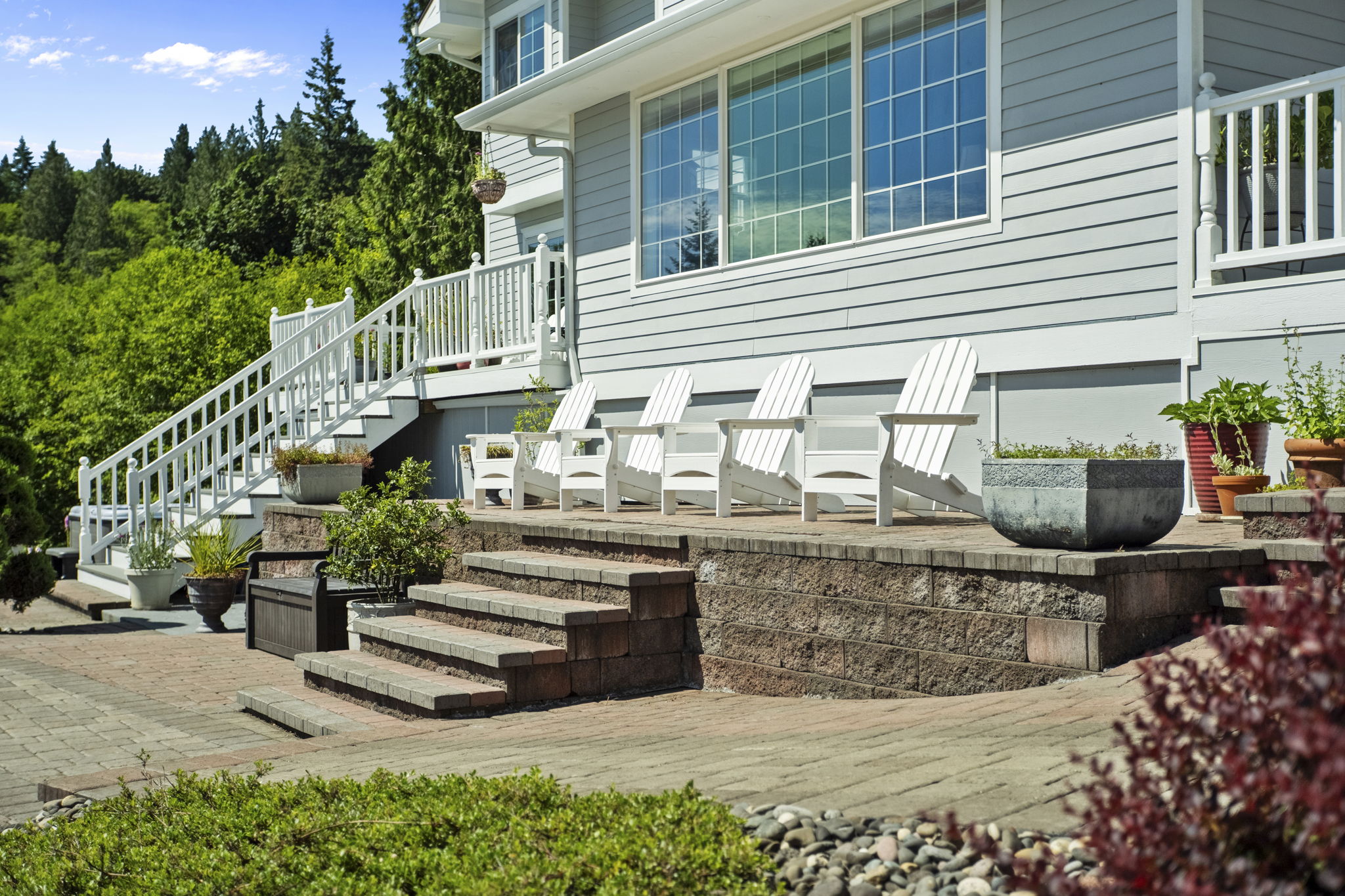 Deck and seating area behind a home