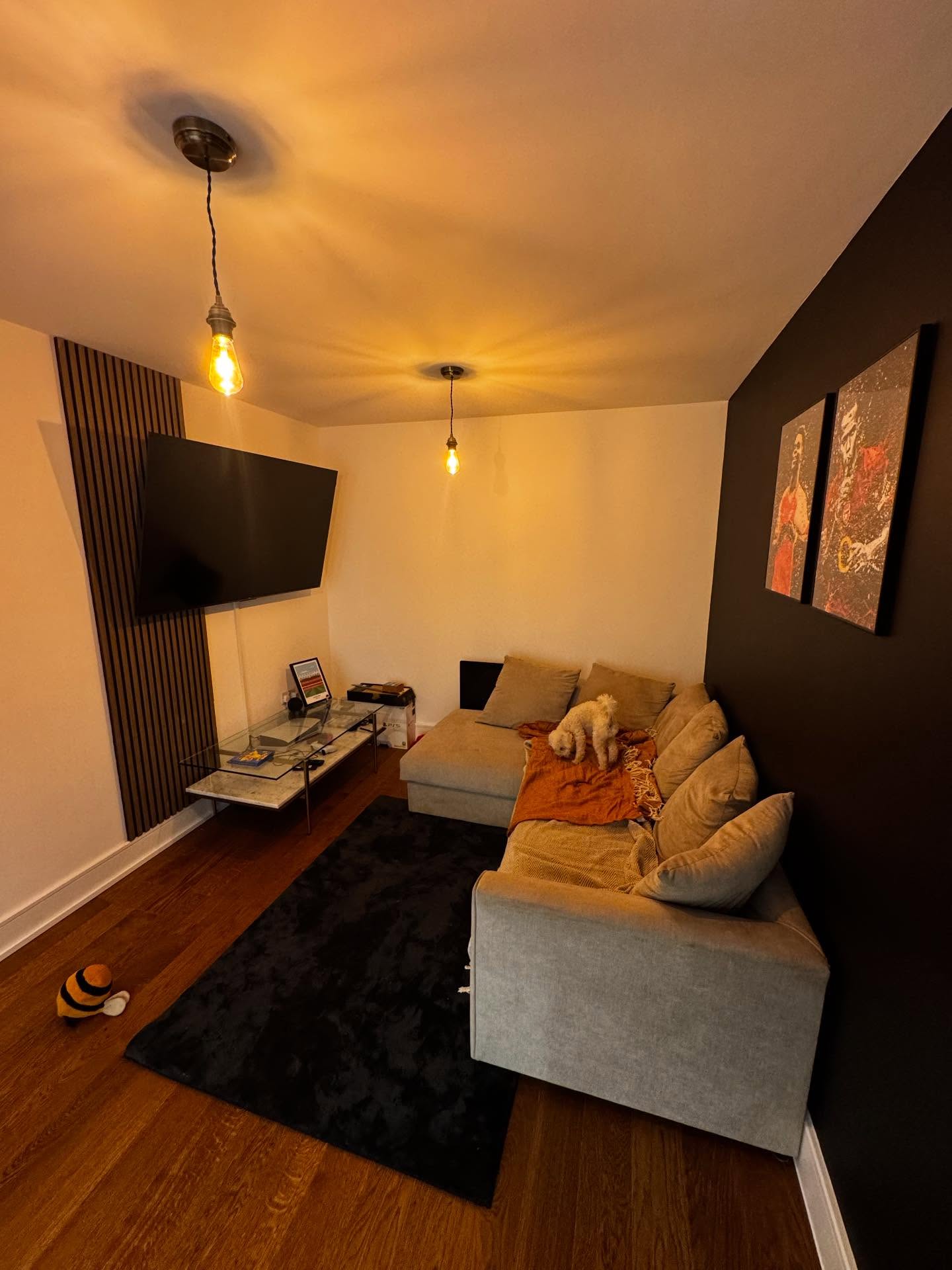 Living room renovation with feature fireplace wall