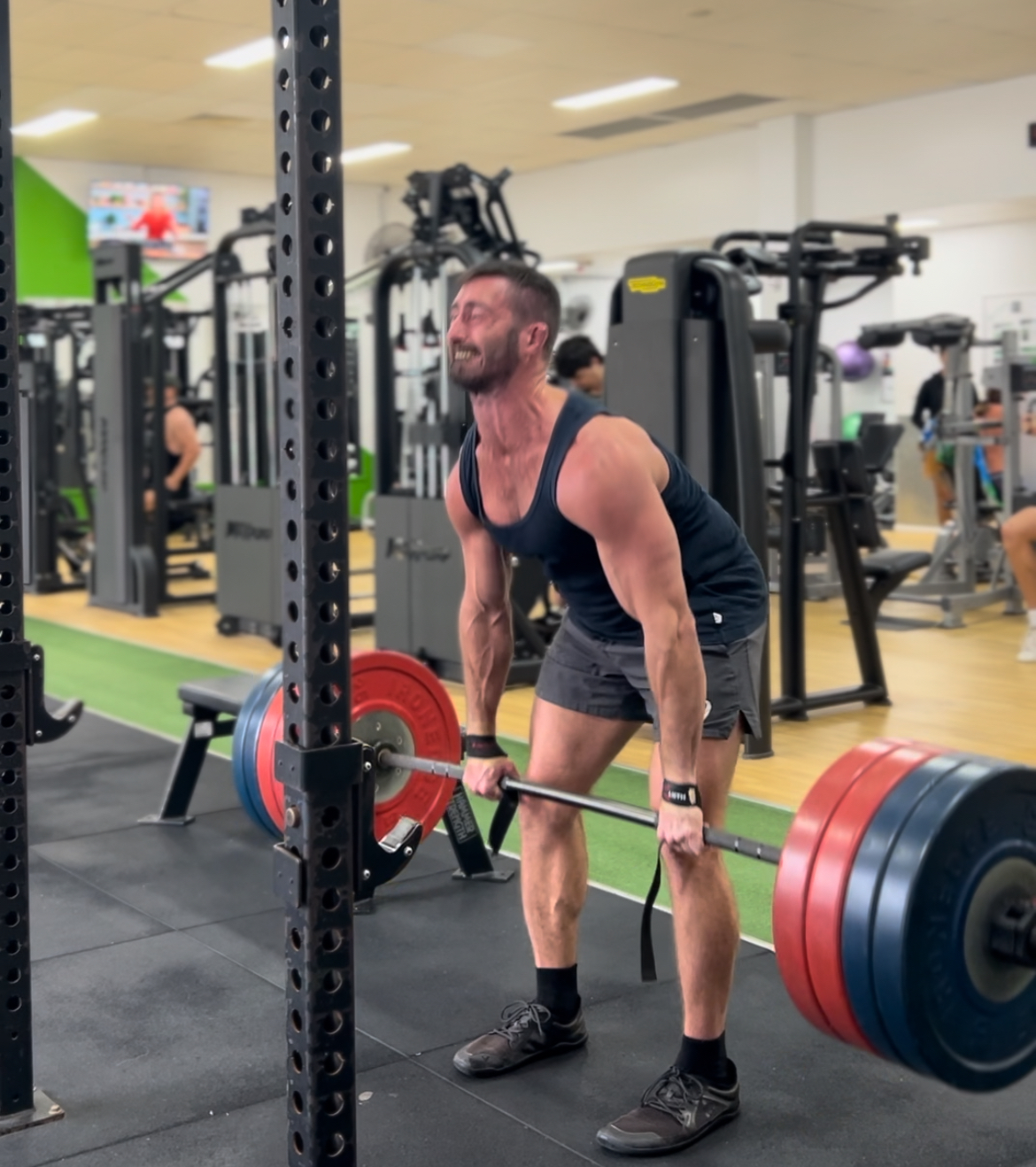 Rugby player lifting weights