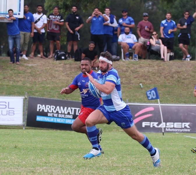 Pat Searson playing rugby