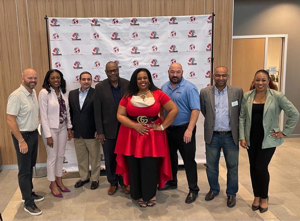 Ieshea Hollins with industry colleagues and collaborators at a TechDemic branded event