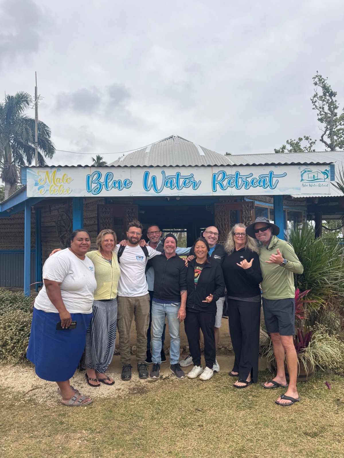 A group outside Blue Water Retreat
