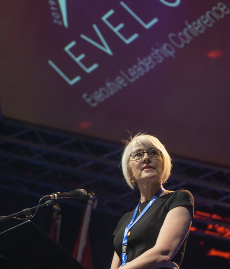 Nikki Csek speaking at the Level Up conference