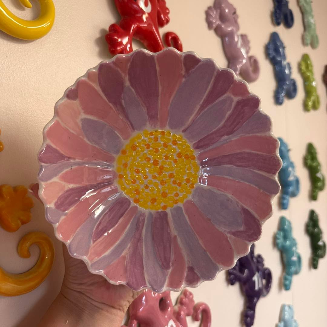 Finished painted pottery piece from Puffin Pottery