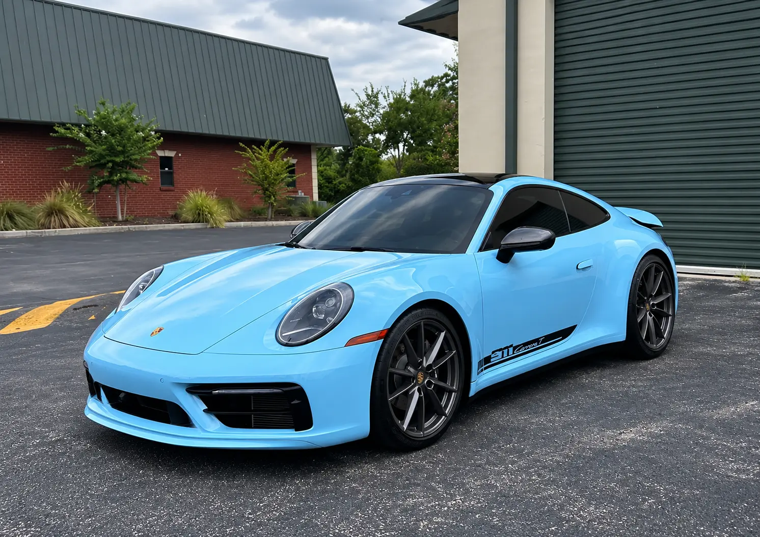 Light blue Porsche 911 with ceramic window tint