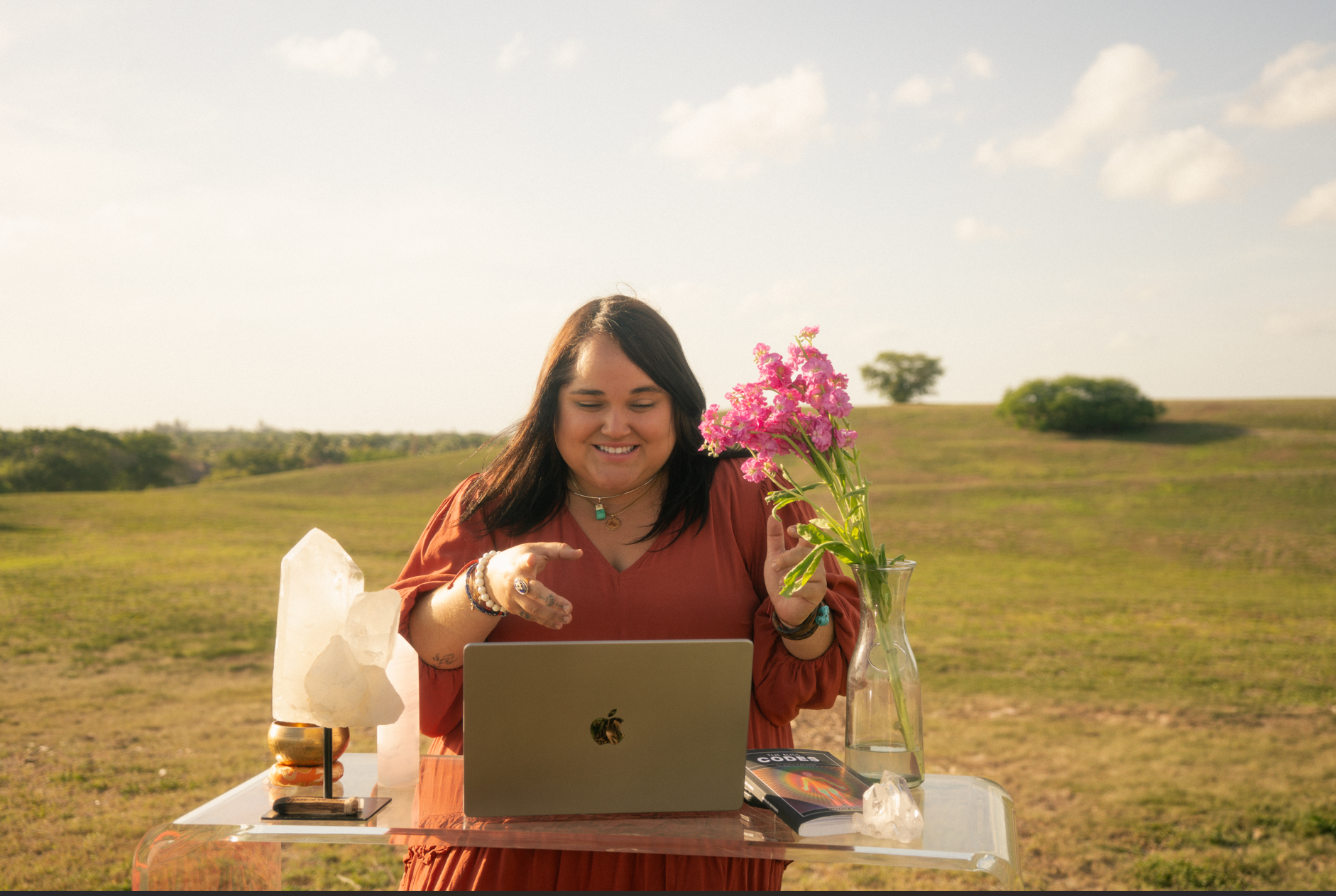 Natalie Restrepo working from her laptop