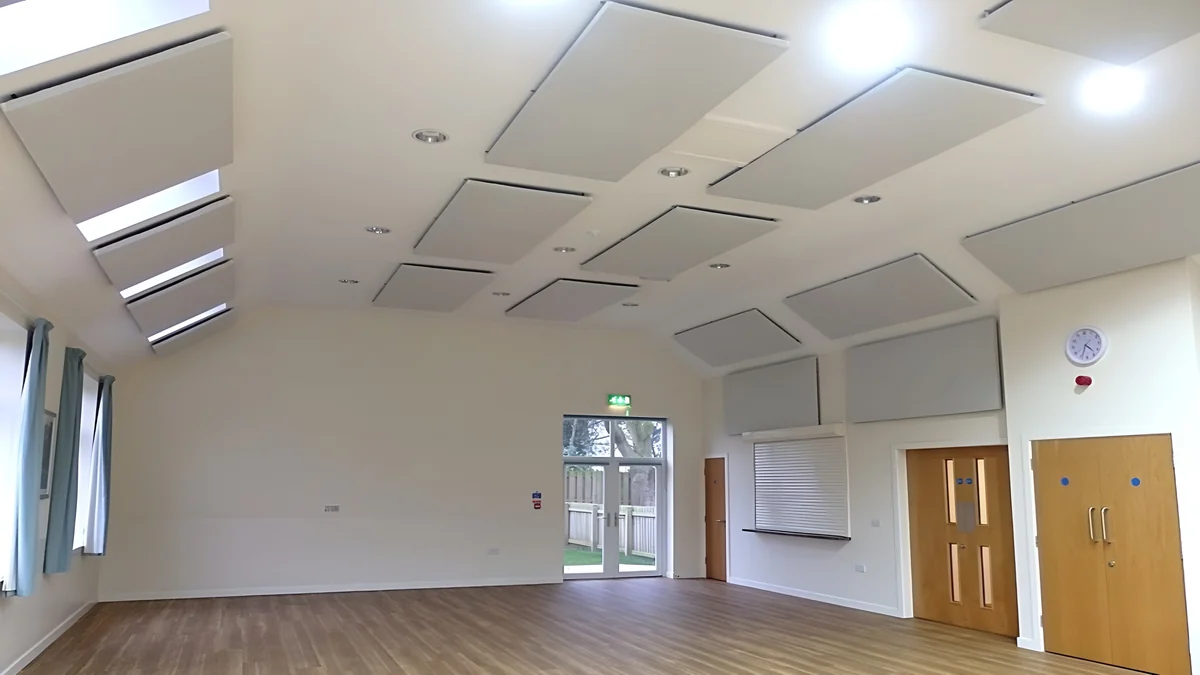 Acoustic panels fitted around rooflights and to the walls of Kirk Deighton Village Hall.