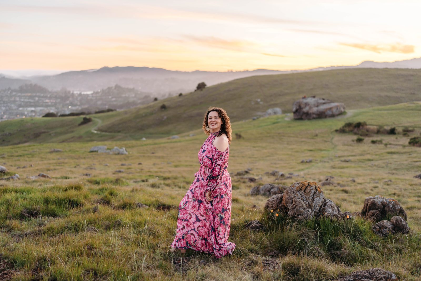 Adriana in the golden hills at sunset