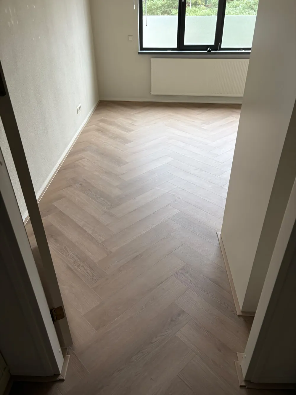 Pvc visgraatvloer op vloerverwarming in Bilthoven