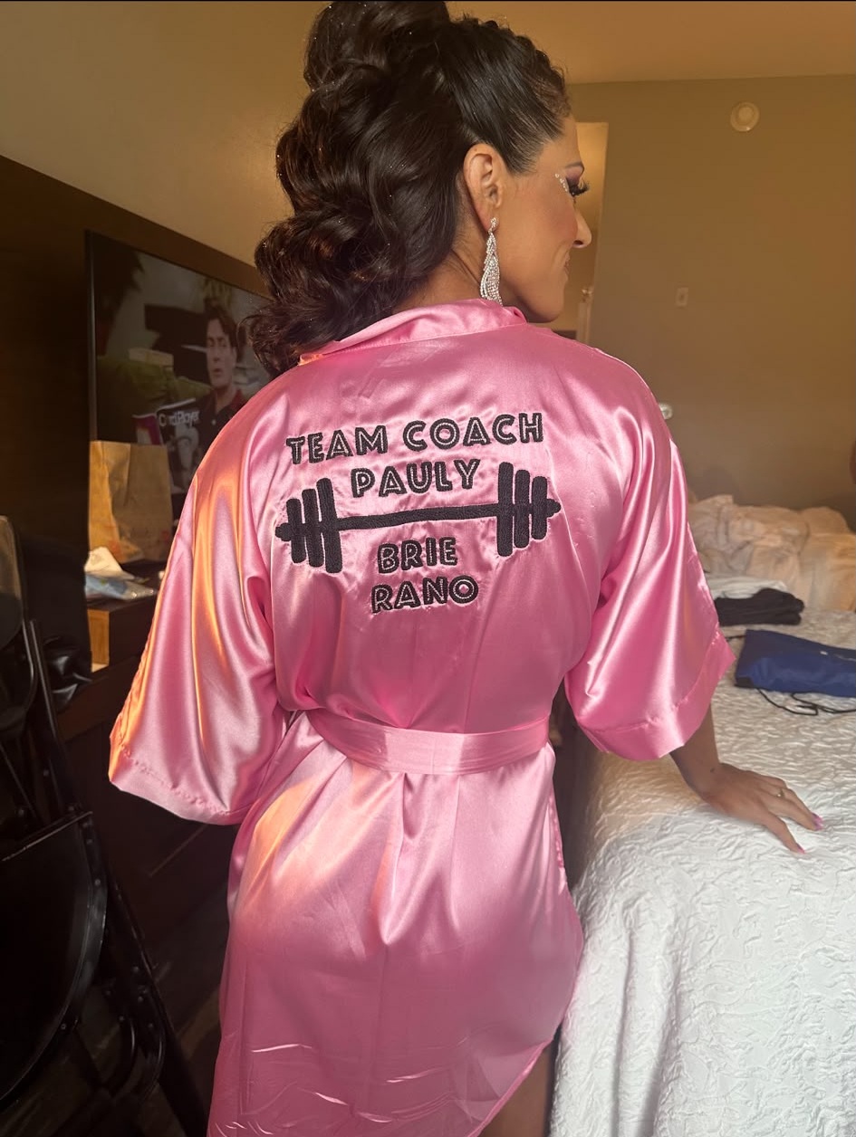 Team Coach Pauly competitor in competition robe