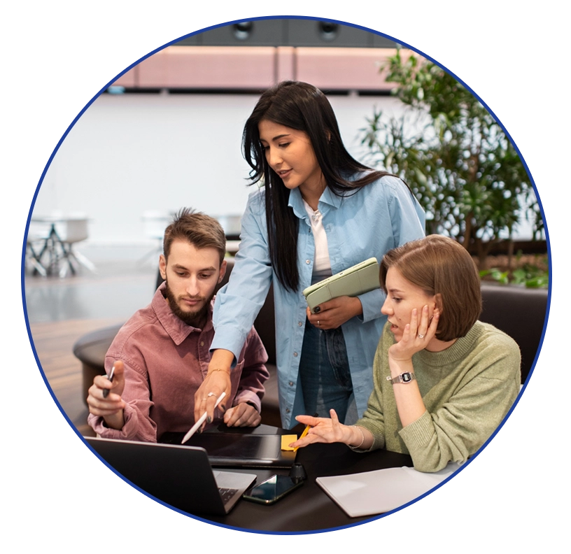 Team collaborating on digital marketing strategies, discussing web design and branding solutions, with focus on tablet and laptop.