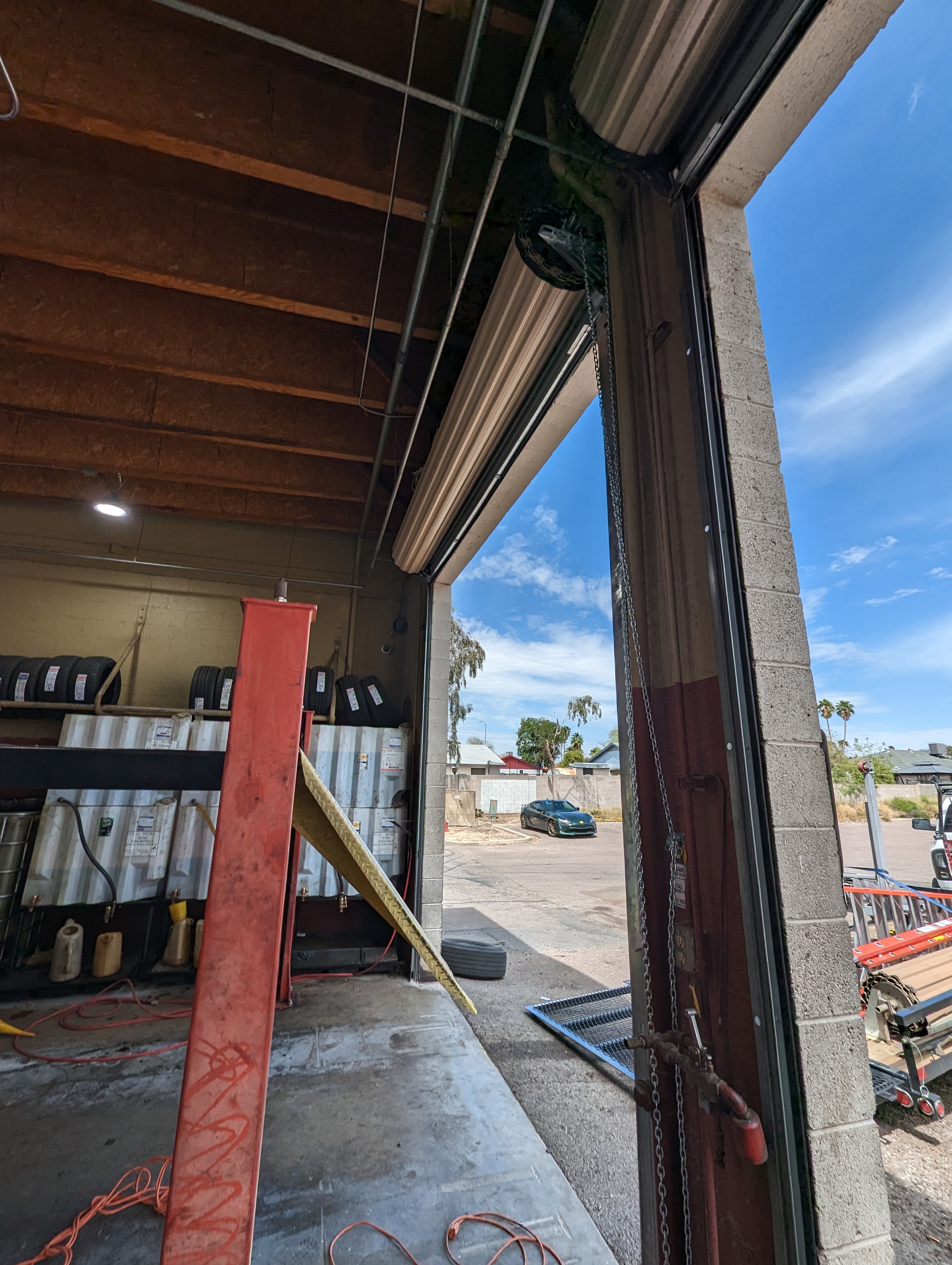 Commercial overhead door repair by Hinged Overhead Door