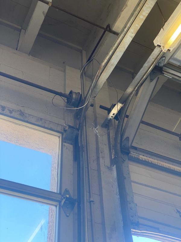 Garage door lift cable repair by Hinged Overhead Door