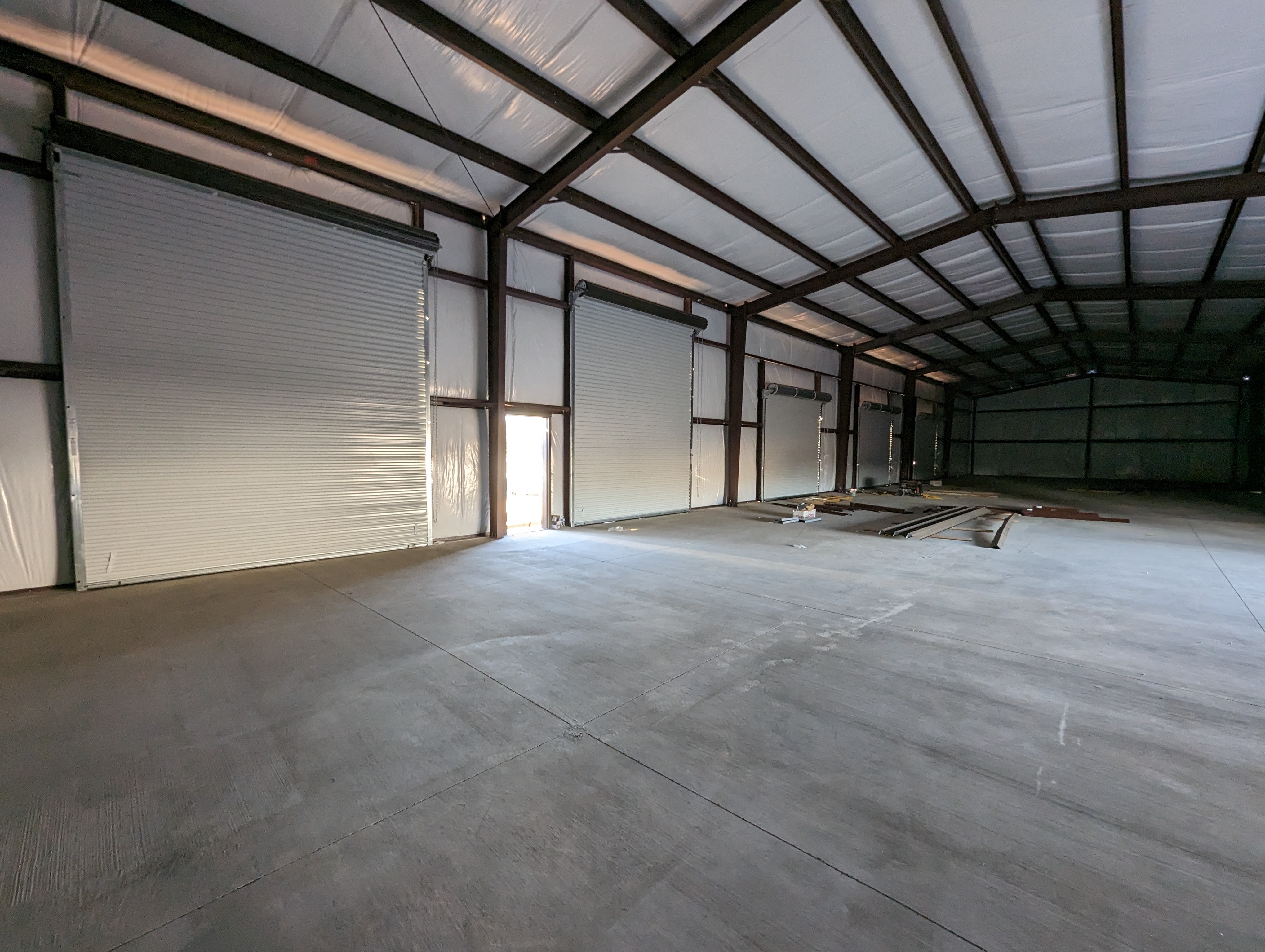 Commercial overhead door installation by Hinged Overhead Door