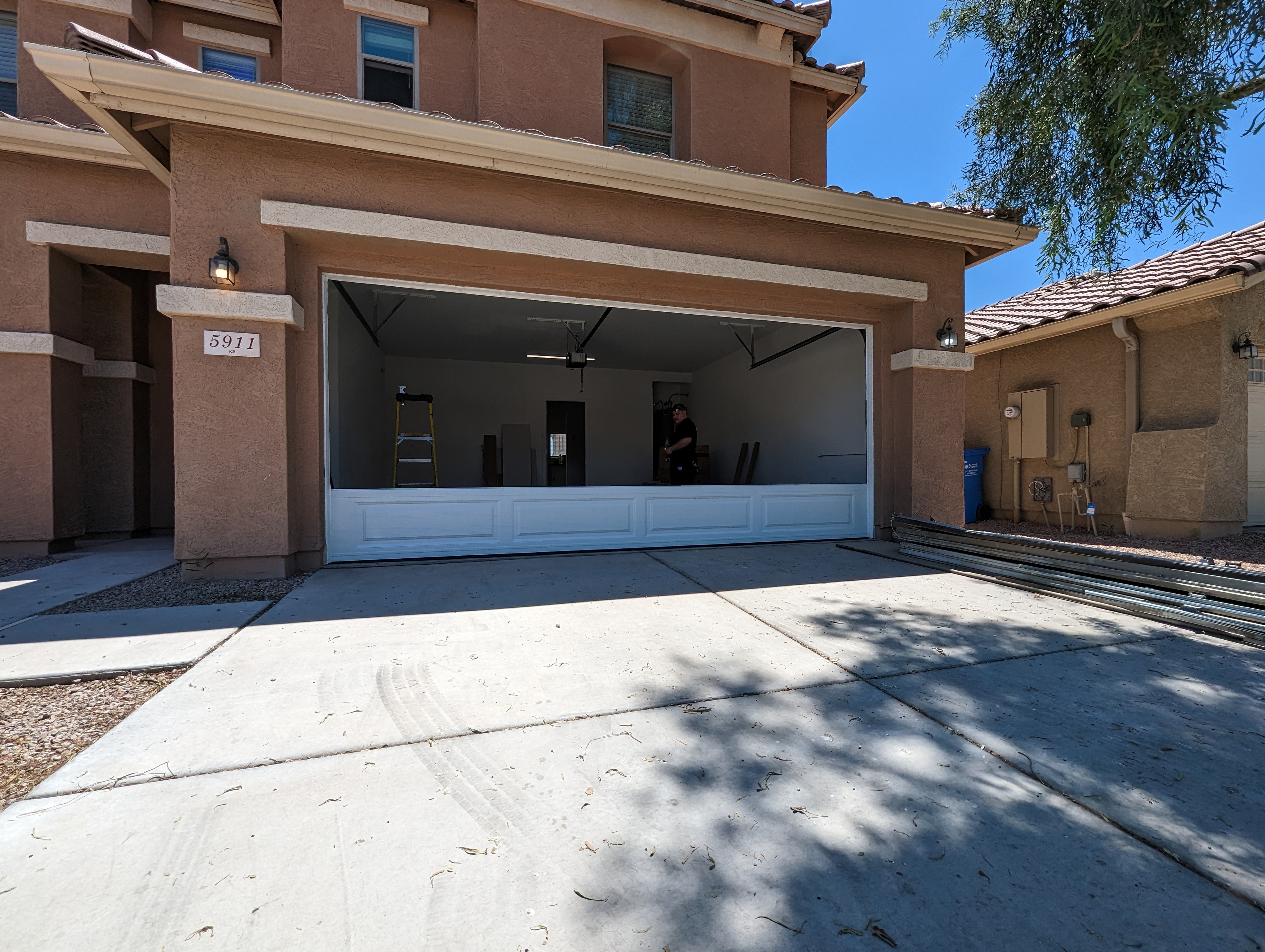 New residential garage door installation by Hinged Overhead Door