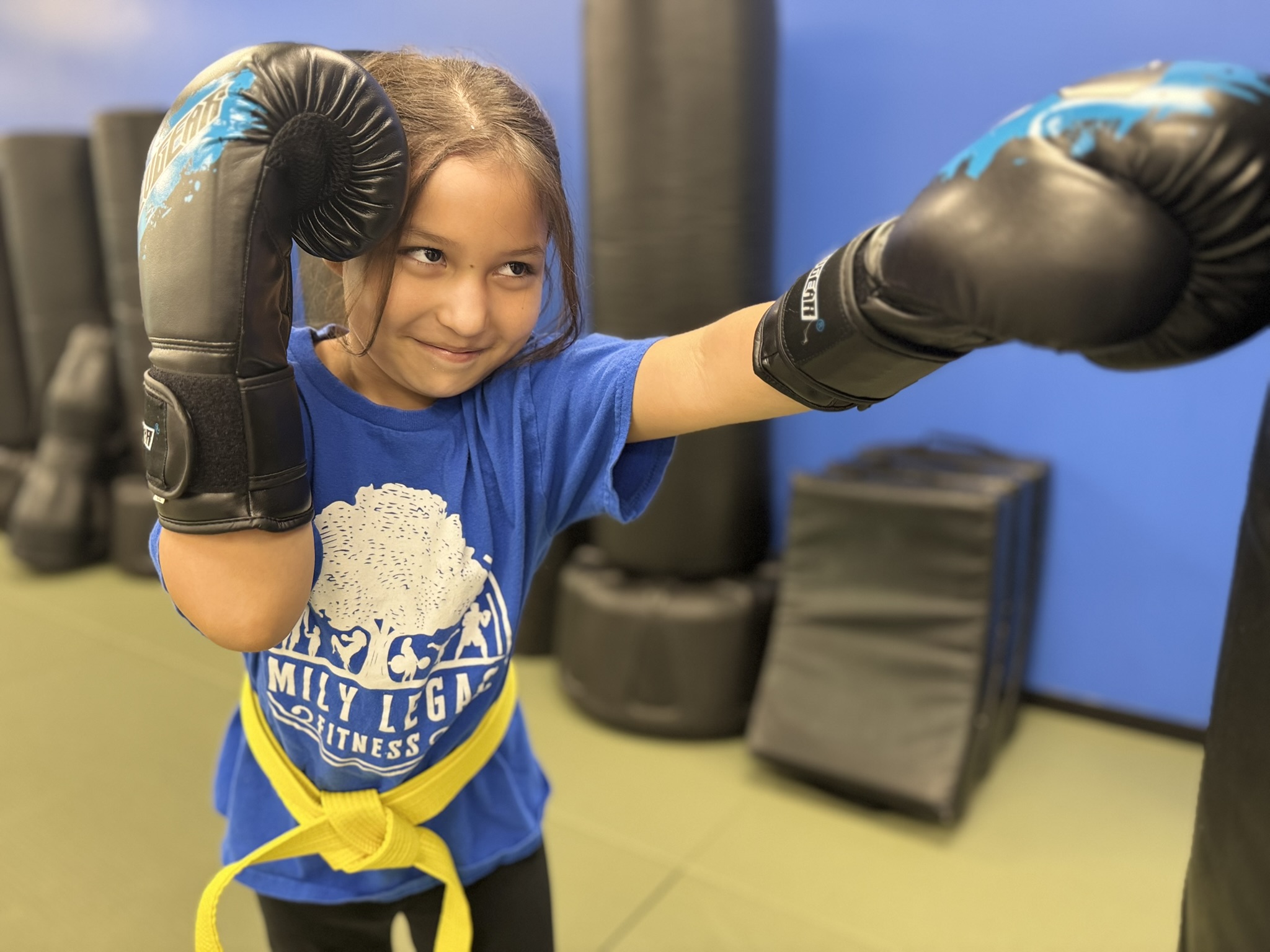 Child building confidence through martial arts training