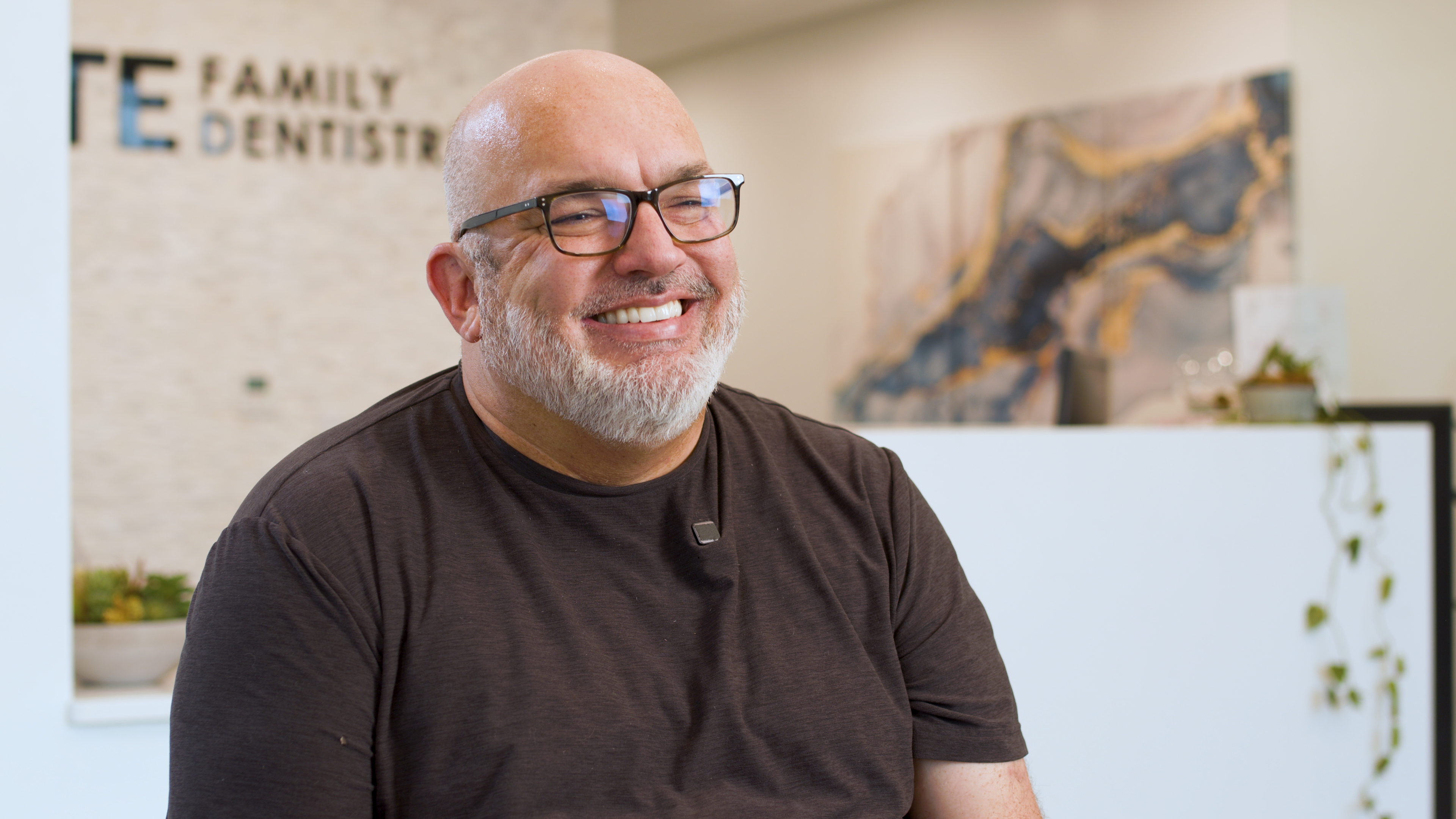 Patient smile after dental implant treatment