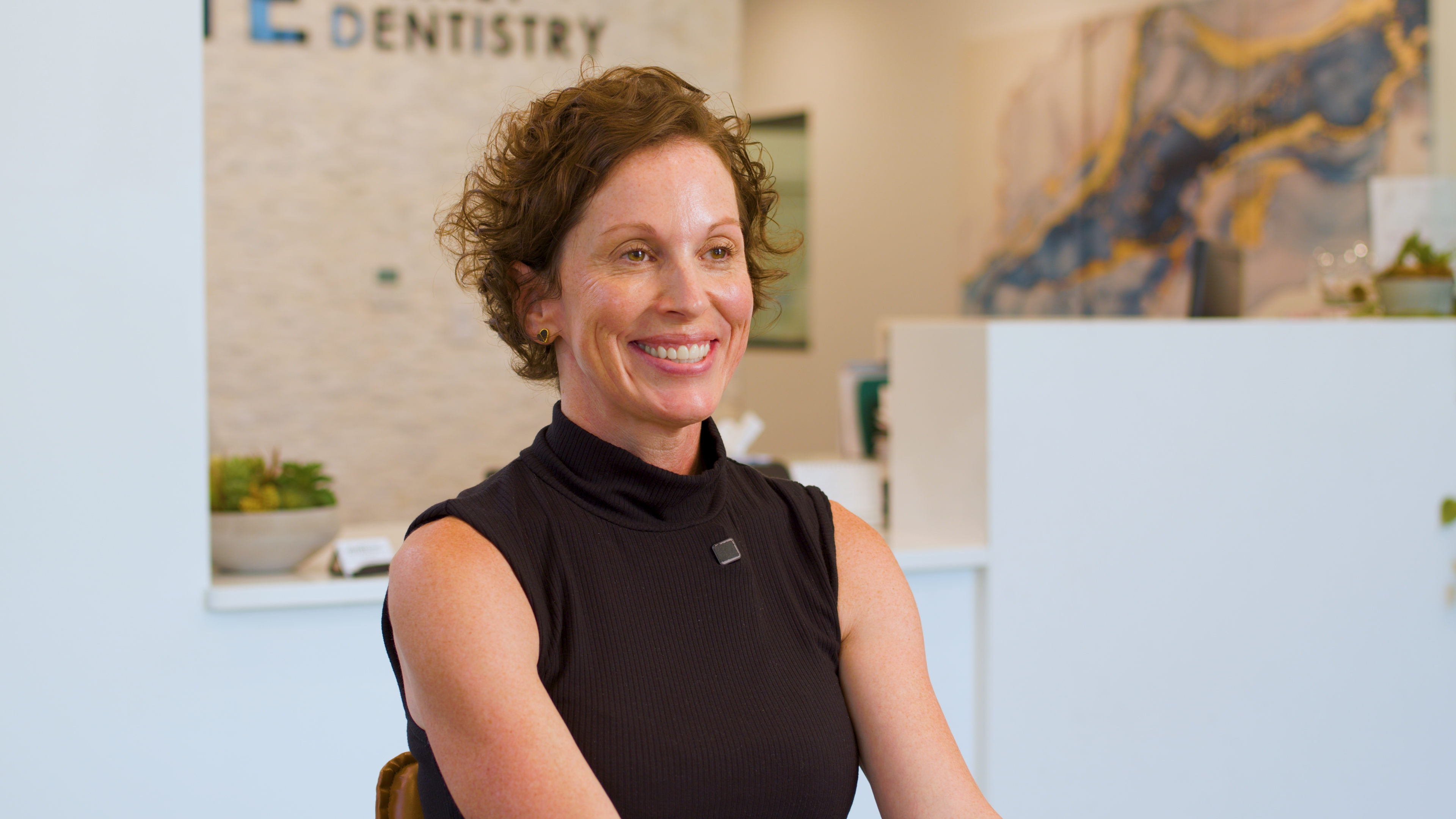 Patient smile after dental implant treatment