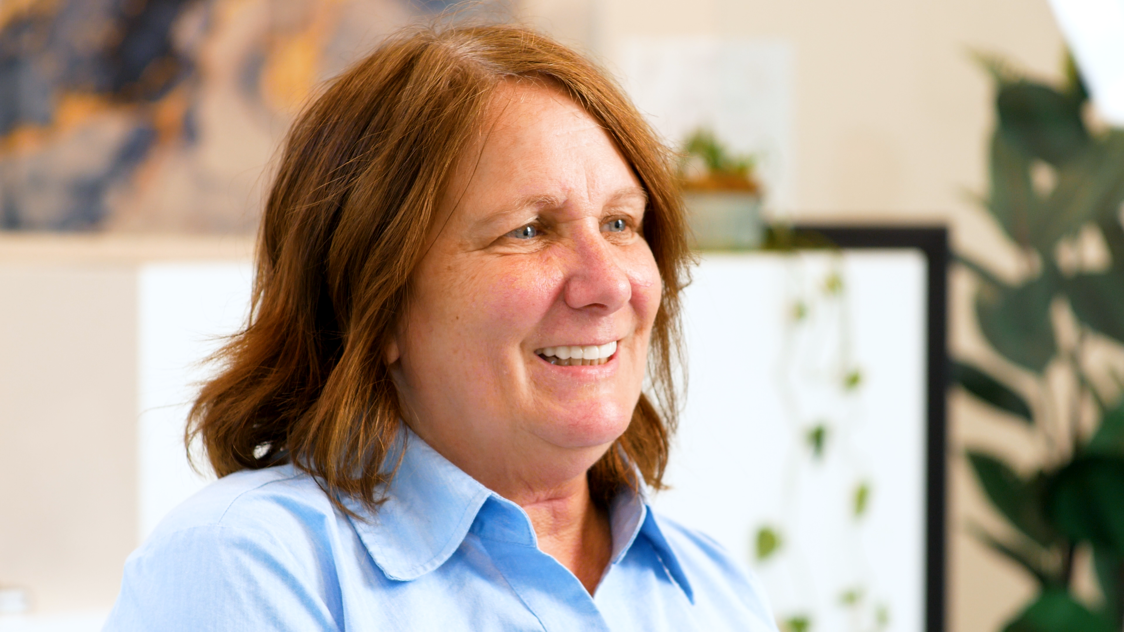 Patient smile after dental implant treatment