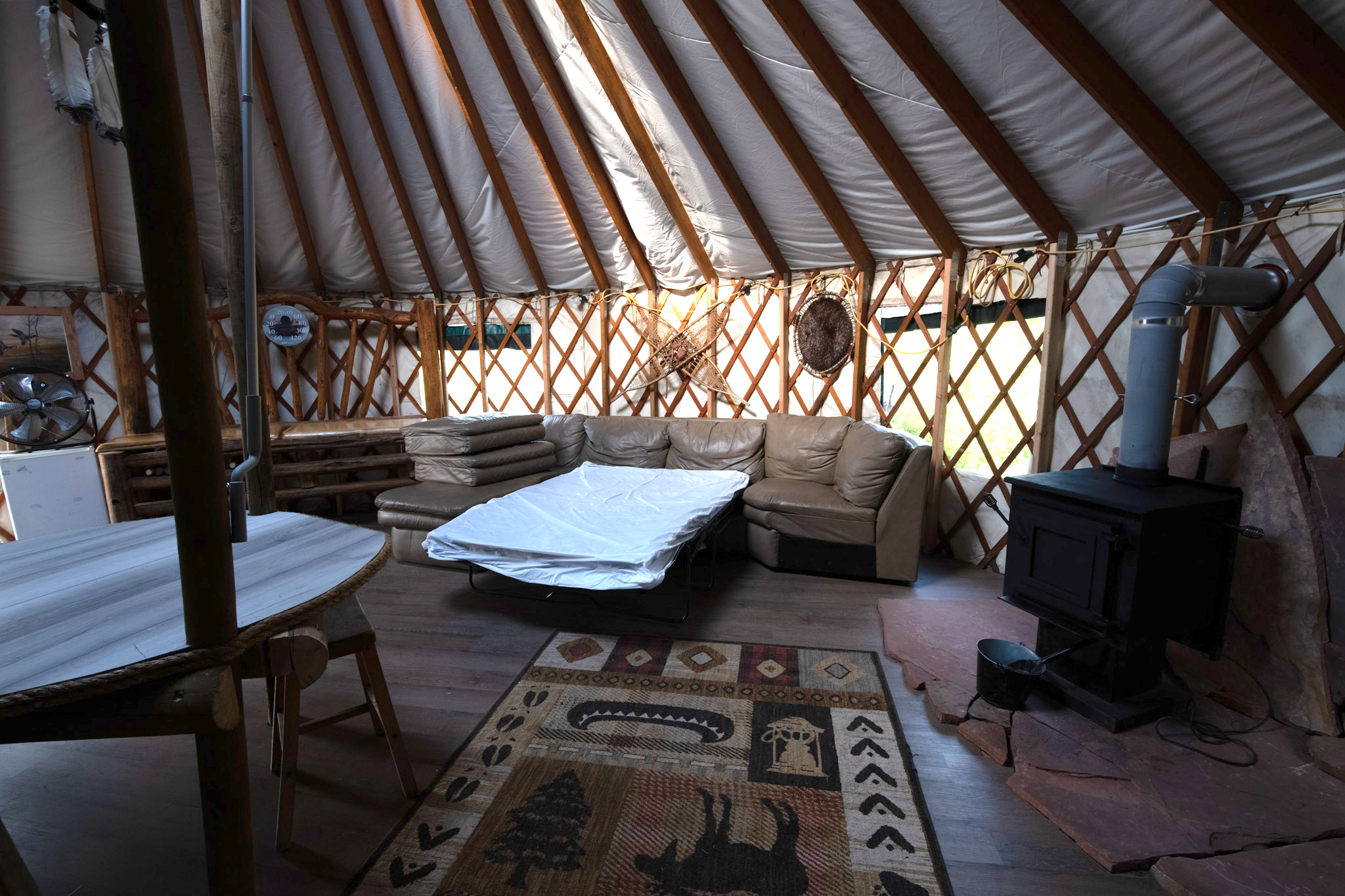 The sectional's full-size hide-a-bed, made up