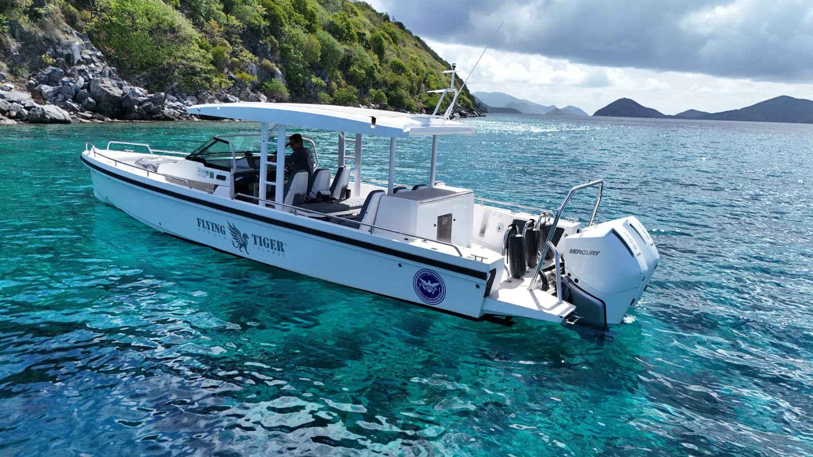 Flying Tiger boat surrounded by tropical islands