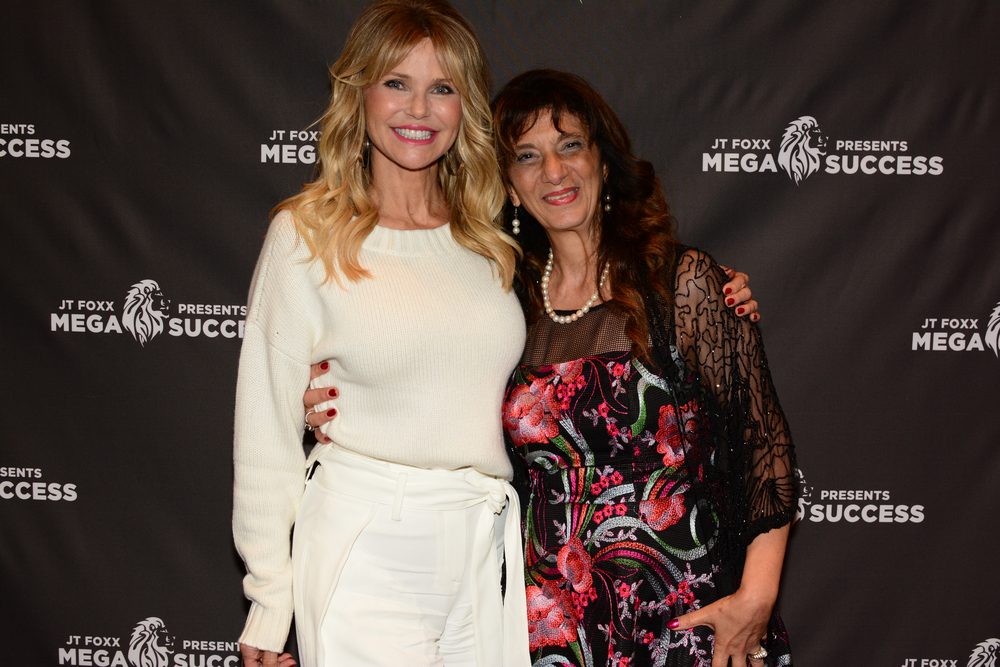 Dr. Dalal Akoury poses with supermodel Christie Brinkley at an industry event