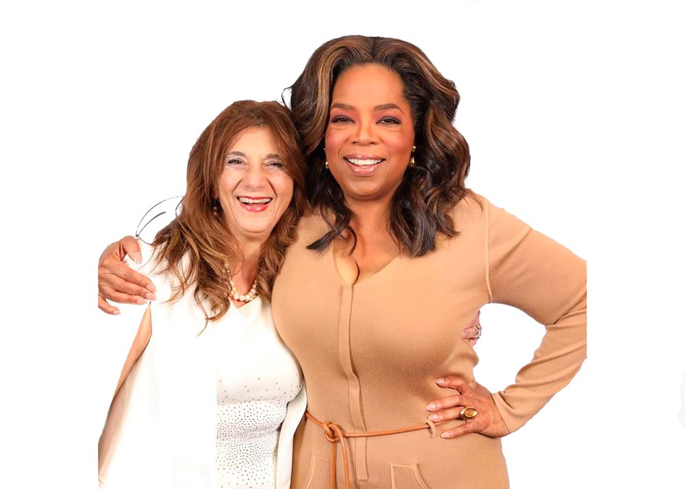 Dr. Dalal Akoury shares a joyful moment with media icon Oprah Winfrey