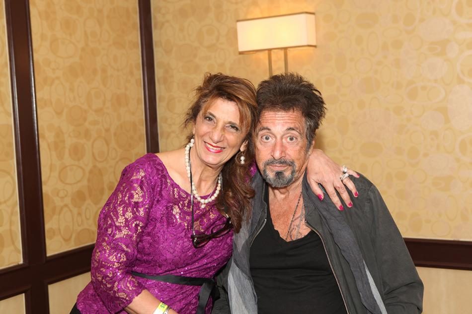 Dr. Dalal Akoury shares a warm moment with acclaimed actor Al Pacino at an industry event