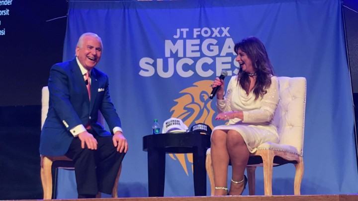 On-stage interview at a JT Foxx Mega Success event