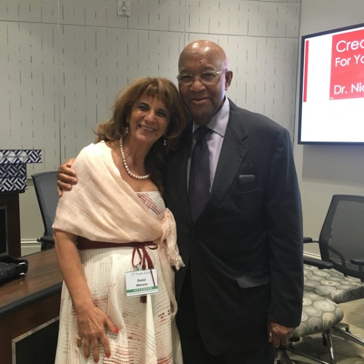Dr. Dalal Akoury connects with Commissioner Rodney Ellis at a JT Foxx business conference