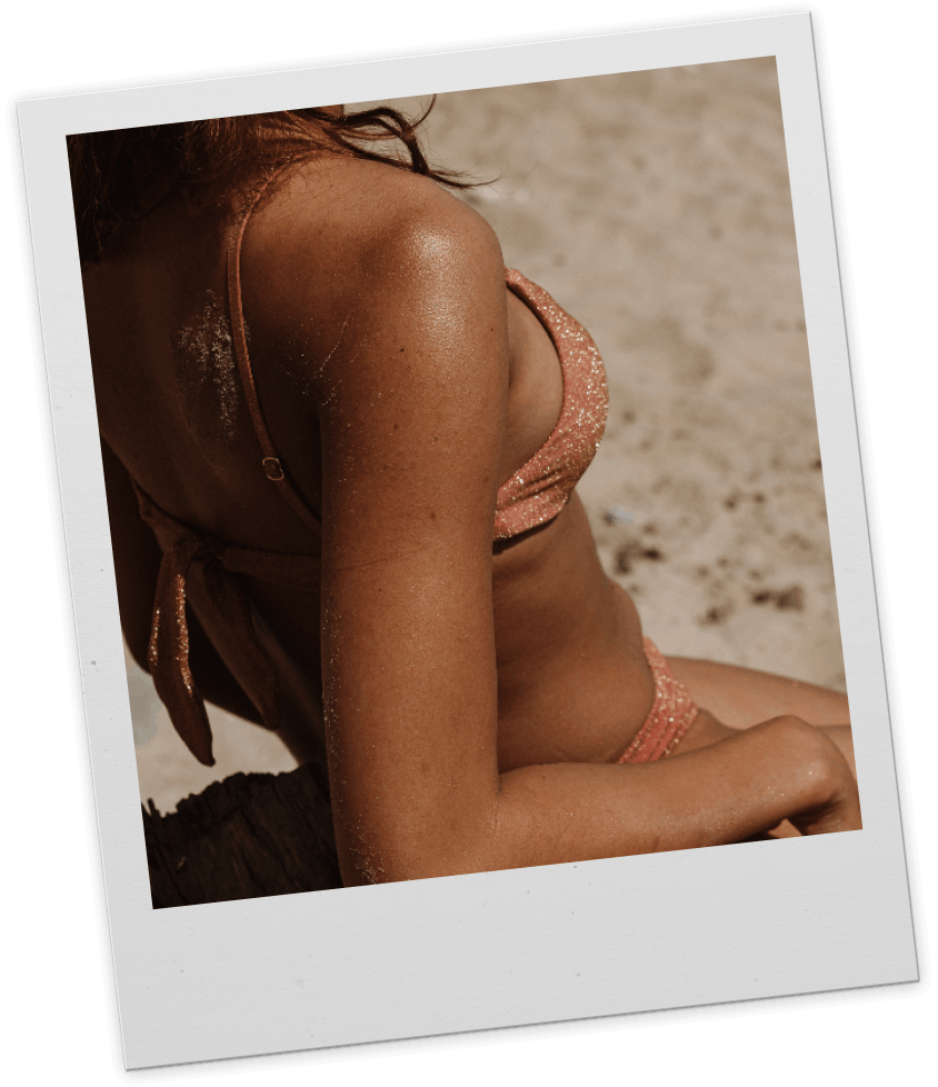 Young woman tanning in the sunshine 